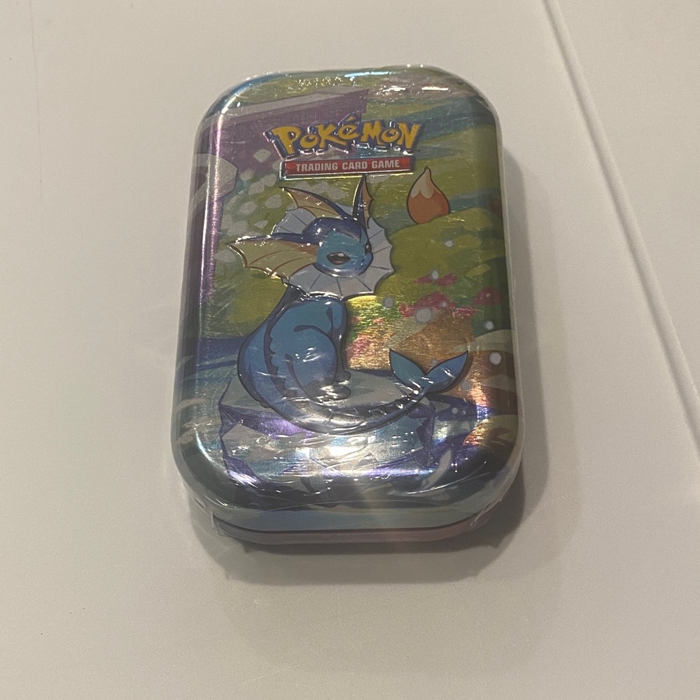 Pokemon Vaporeon Blue and Green Tin